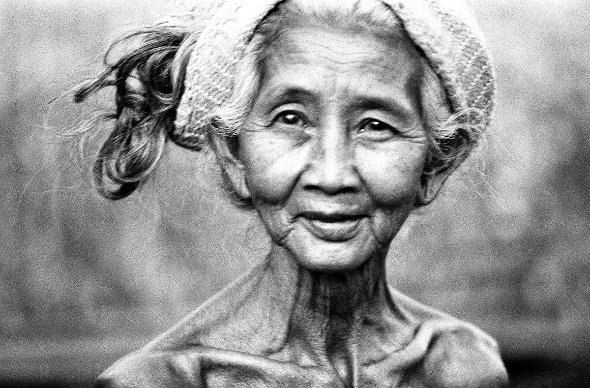 Woman with hat in Bali, Andy Summers